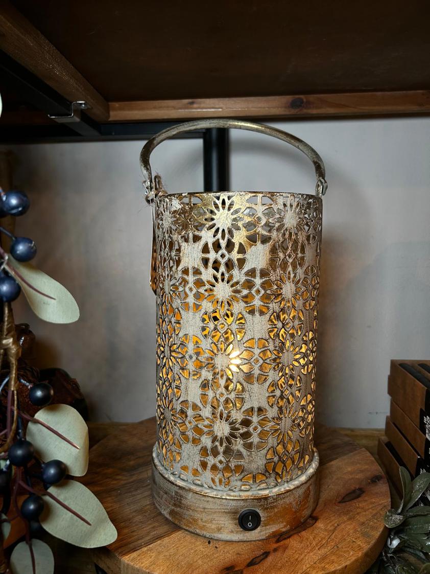 A Rustic Lantern with a light bulb Battery Operated