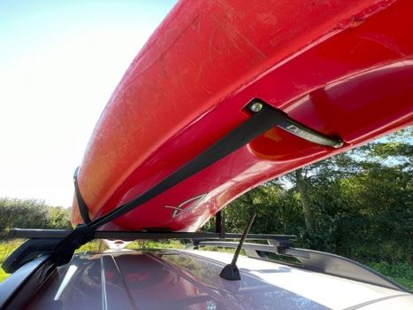 Strap tied through carry handle