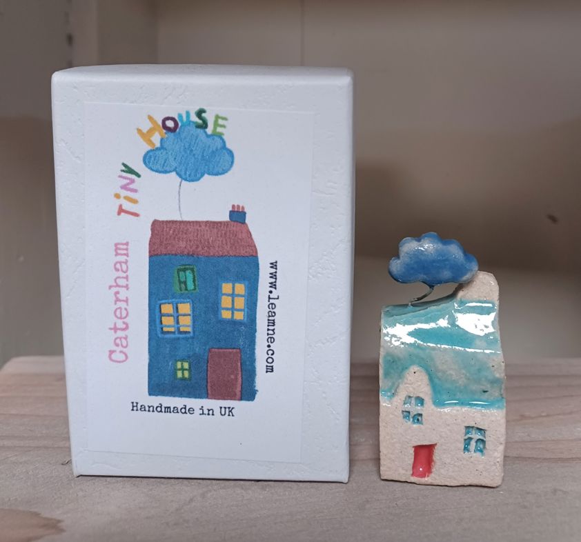 Blue Roof Cloud Handmade miniature cottages, in a Caterham Tiny House Box