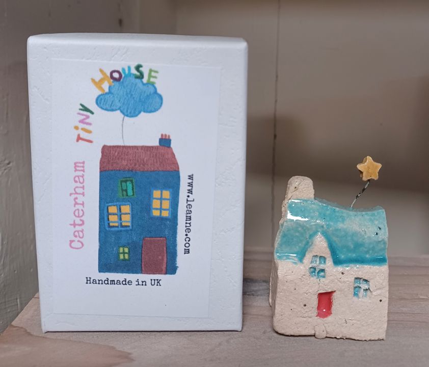 Blue Roof Star Handmade miniature cottages, in a Caterham Tiny House Box