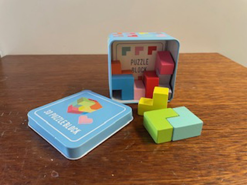 Wooden 3D puzzle in a tin