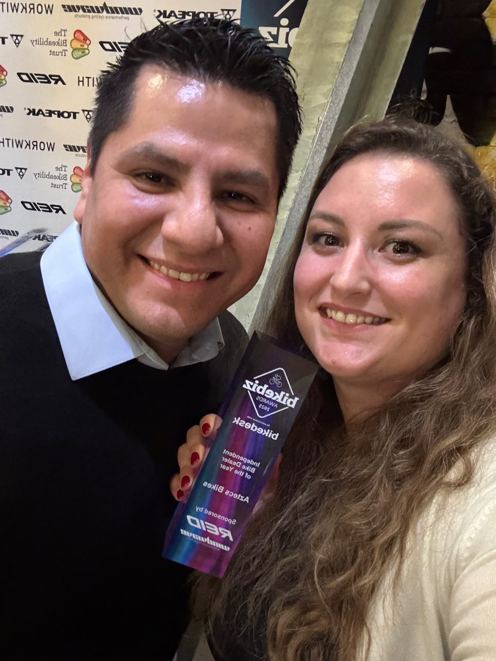 Marco and Angie with the BikeBiz Independent Bike Dealer of the Year award