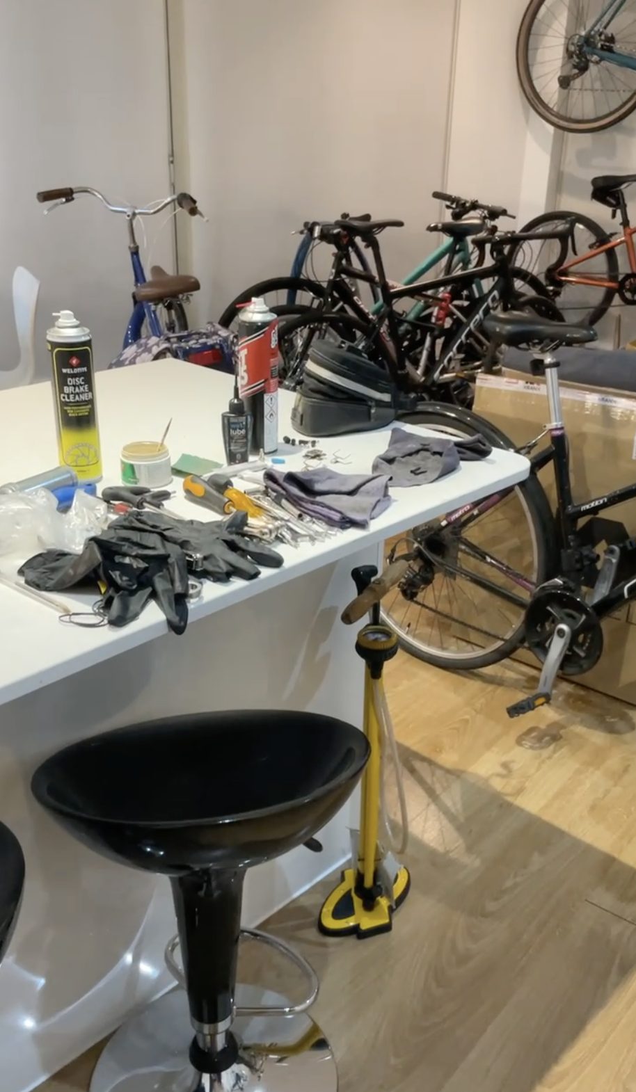 Bikes and repair tools filling the living room