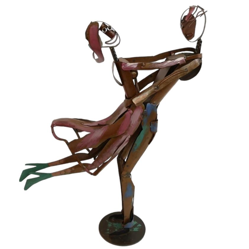 Dancing boy and girl sculpture