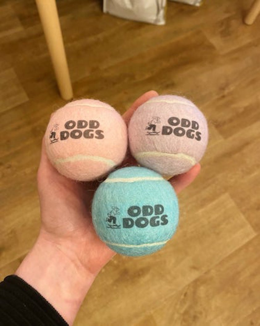 Pastel Pink Odd Dogs Tennis Ball