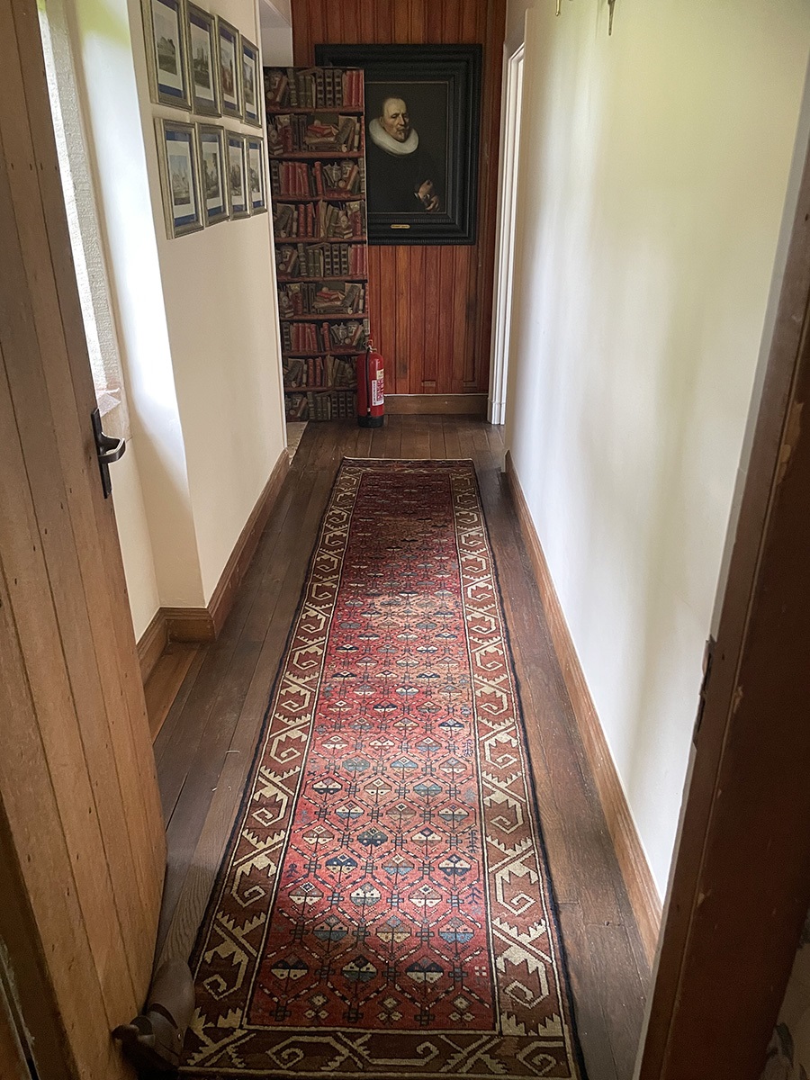 The office passageway: Antique Heriz Runner